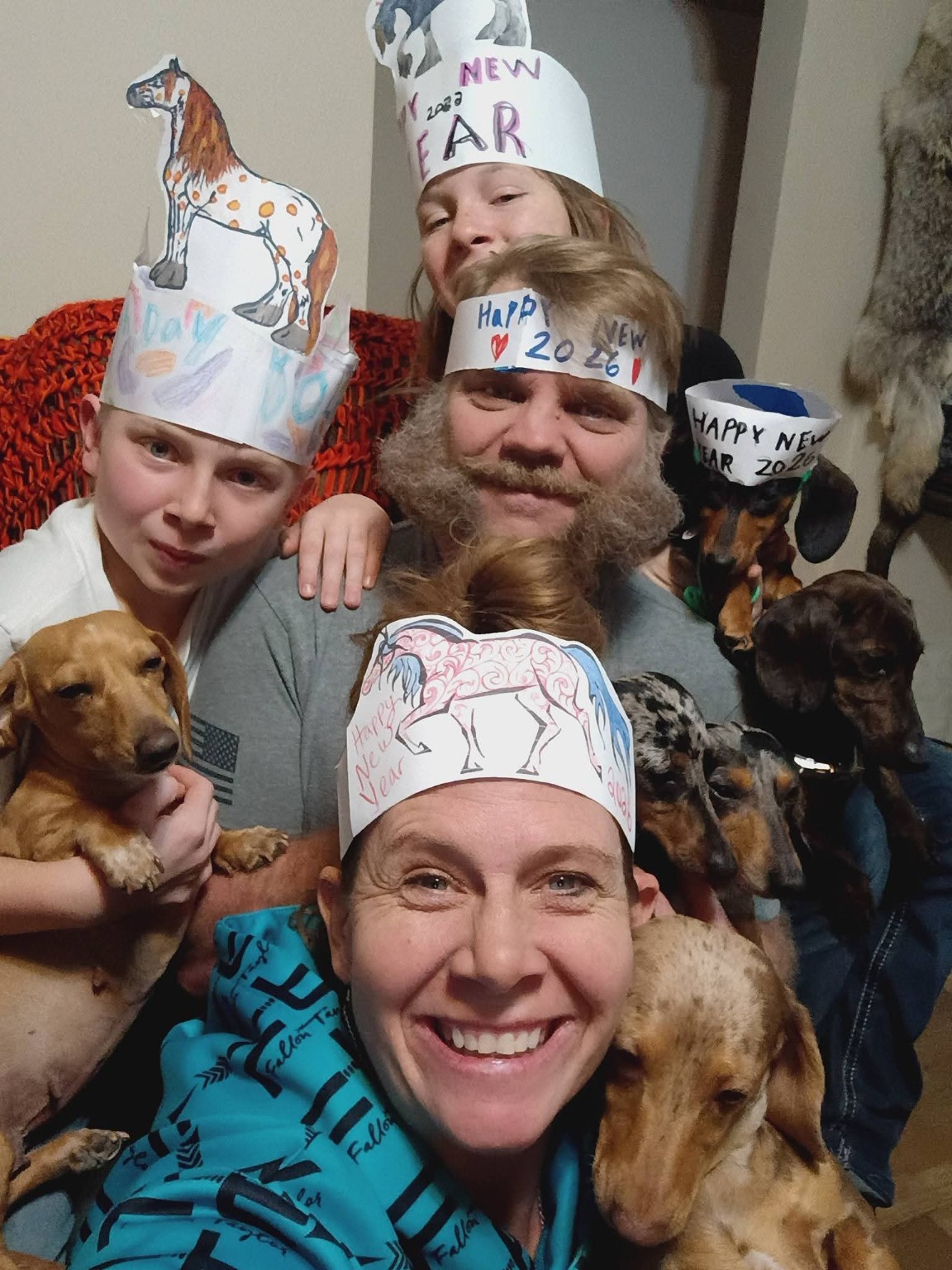 The Lillibridge family celebrating with their dachshunds